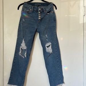 Distressed denim jeans